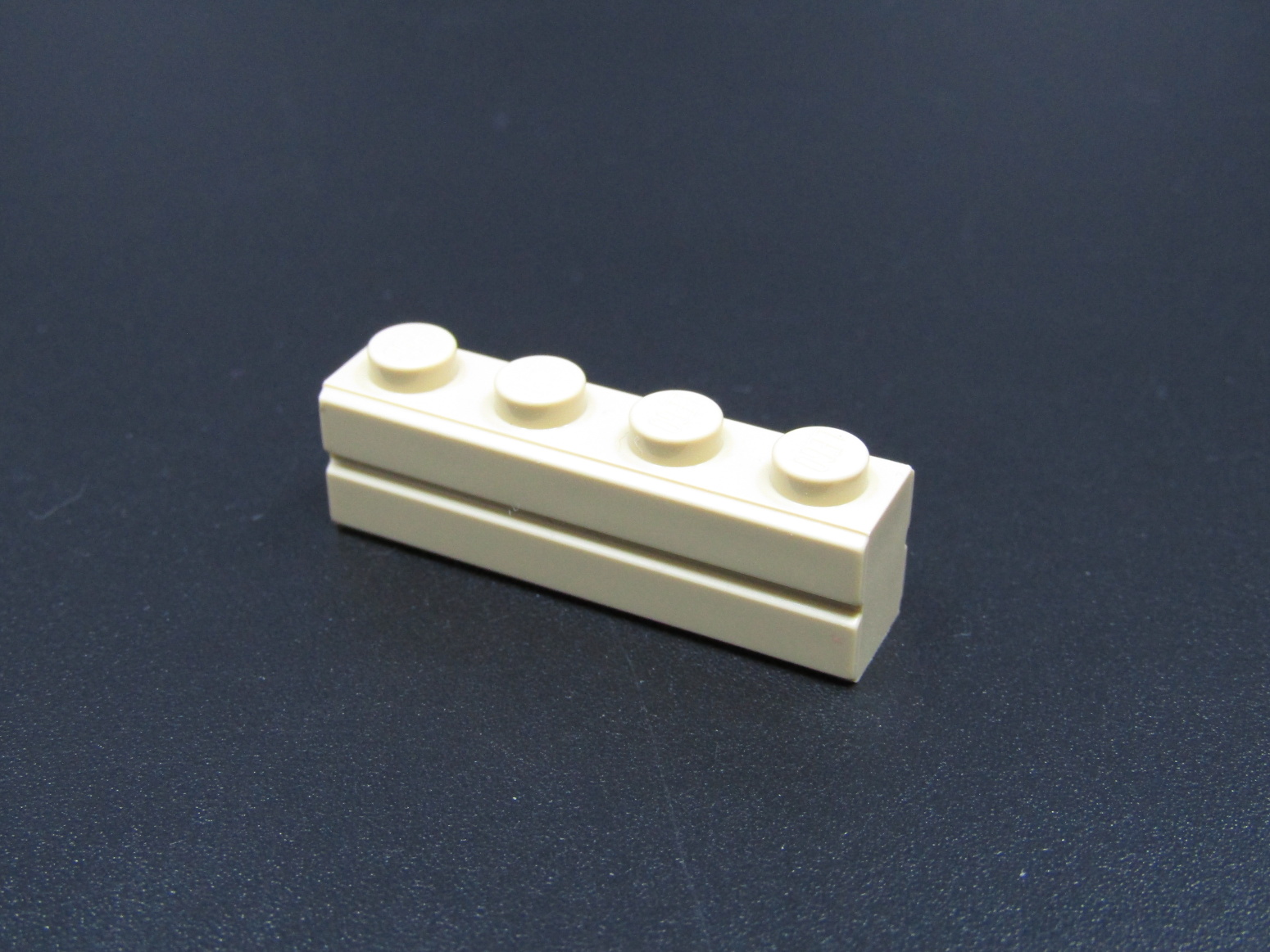 Lego kostička speciální - cihla 1x4 - béžová