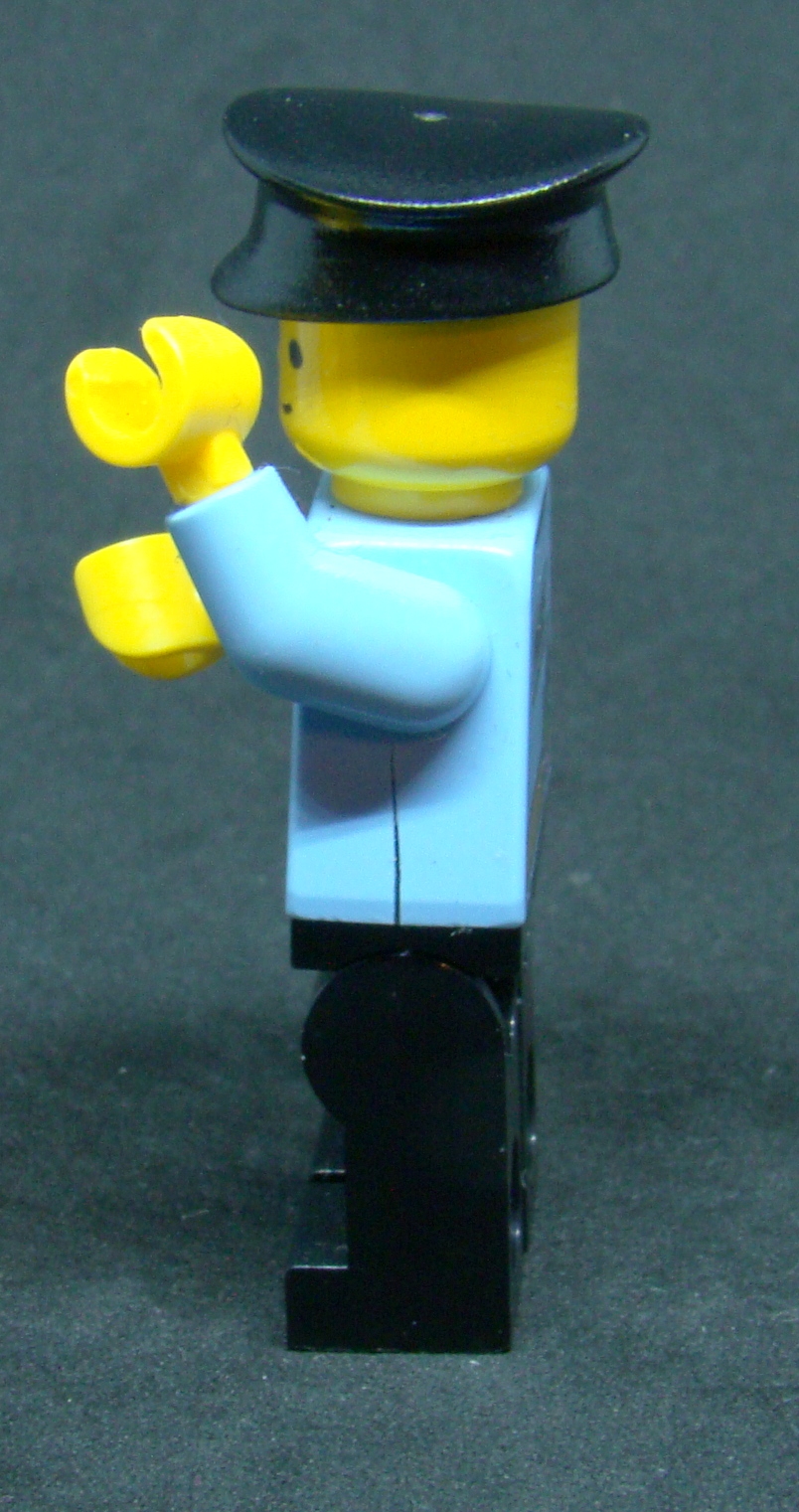 Lego figurka policista - prasklé tělo