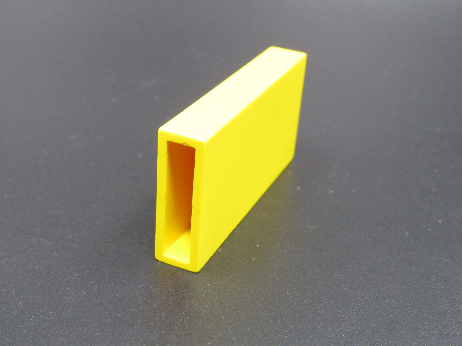 Lego kostka vysoká 1x3x5 - žlutá