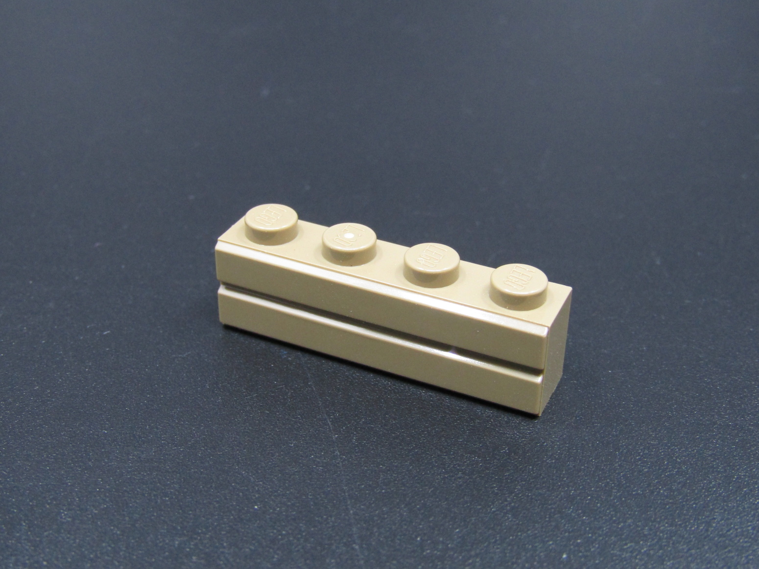 Lego kostička speciální - cihla 1x4 - tmavě béžová