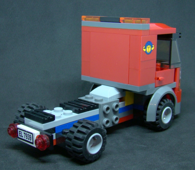 Lego auto - tahač návěsů + figurka