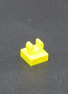 Lego speciální kostička s klipem 1x1 - žlutá