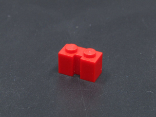 Lego kostička speciální s drážkou 1x2 - červená