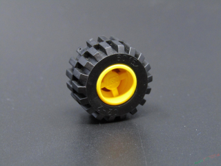 Lego kolo 11mm x 21mm - křížový malý pin žluté