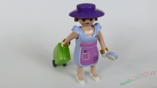Playmobil figurka s nasazovacími šaty, kloboukem, kartáčem a cestovním kufrem