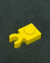 Lego destička speciální 1x1 s klipem - žlutá