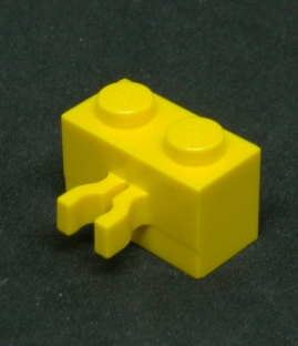 Lego kostička s klipem 1x2 - žlutá