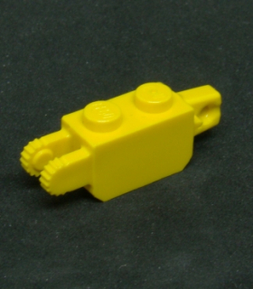 Lego kostička závěs 1x2 žlutá