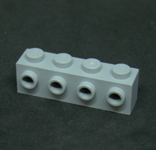 Lego kostička speciální 1x4 s nopy - světle šedá - light bluish gray