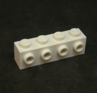 Lego kostička speciální 1x4 s nopy - bílá
