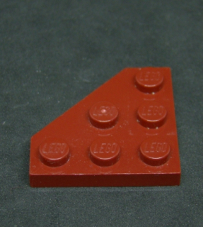 Lego destička klín 3x3 zkosený roh tmavě červená