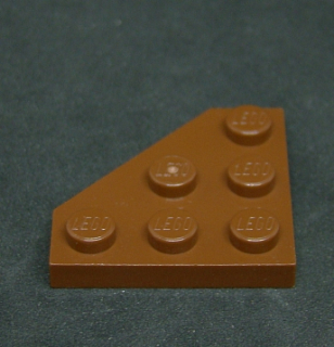 Lego destička klín 3x3 zkosený roh hnědá - reddish brown
