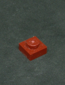 Lego destička 1x1 tmavě červená