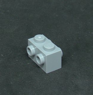 Lego kostička speciální s výstupky na obou stranách - světle šedá - light bluish gray
