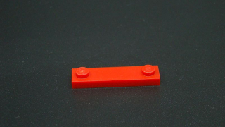 Lego destička speciální s nopy 1x4 - červená