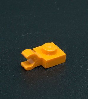 Lego destička speciální 1x1 s klipem - oranžová