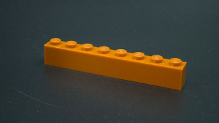 Lego kostička 1x8 tmavě oranžová