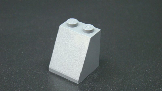 Lego kostička šikmá 65° 2x2 - tmavě šedá - dark bluish gray