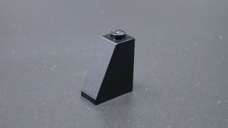 Lego kostička šikmá 65° 2 x 1 x 2 - černá