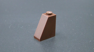 Lego kostička šikmá 65° 2 x 1 x 2 - tmavě hnědá