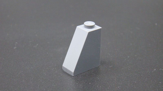 Lego kostička šikmá 65° 2 x 1 x 2 - tmavě šedá - dark bluish gray