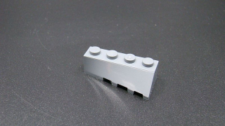 Lego kostička šikmá 45° - zkosená - levá - tmavě šedá - dark bluish gray