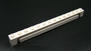 Lego kostička speciální s drážkou 1x14 bílá