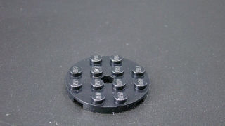 Lego destička kulatá s kulatou středovou dírou - černá