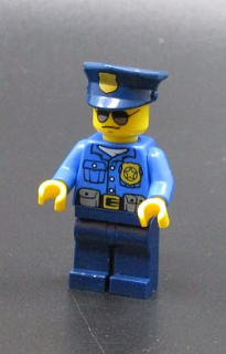 Lego figurka policista - PRASKLÉ RUCE