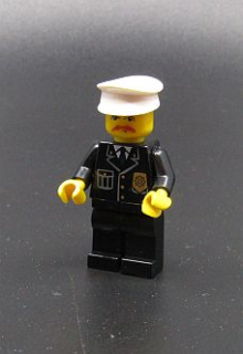 Lego city figurka policista - PRASKLÉ RUCE