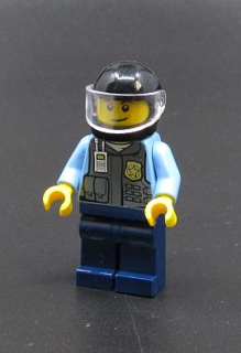 Lego figurka policista - PRASKLÁ RUKA + ODŘENÉ NOHY