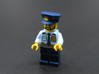 Lego city figurka - policista - PRASKLÉ RUCE