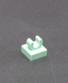 Lego speciální kostička s klipem 1x1 - pískově zelená - sand green